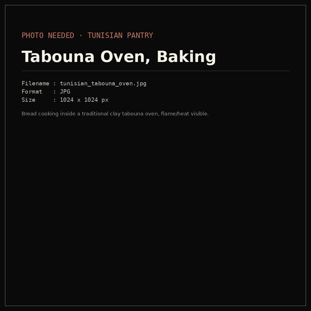 Bread cooking inside a traditional clay tabouna oven, flame/heat visible.